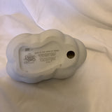 The Enesco Precious Moments Collection “Safe In The Arms Of Jesus” Figurine