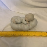 The Enesco Precious Moments Collection “Safe In The Arms Of Jesus” Figurine