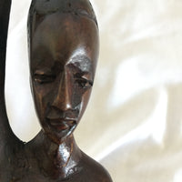 African Wood Lady Carrying Basket On Head