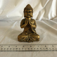 Hindu Gold Colored Sitting Sculpture