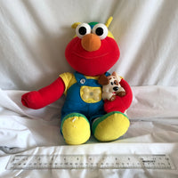 1997 Sesame Street Magic Lights Elmo Plush Toy