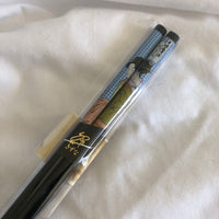 Asian Lady Painting on Black Chopsticks