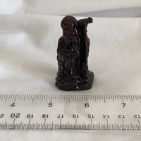 Small Elderly Asian Man With Cane Figurine